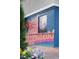 Colorful mural on the exterior of Goodnights Comedy Club, featuring vibrant artwork at 920 W Johnson St, Raleigh, NC 27605