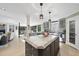 Kitchen featuring a center island with marble countertop and stainless steel appliances at 920 W Johnson St, Raleigh, NC 27605