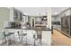Spacious kitchen featuring stainless steel appliances, granite countertops, and breakfast bar seating at 920 W Johnson St, Raleigh, NC 27605