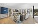 Bright living room featuring an open floor plan, hardwood floors, and stylish furnishings at 920 W Johnson St, Raleigh, NC 27605