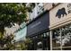 Storefront featuring 'Alton Lane' signage, showcasing the building's architectural style and street presence at 920 W Johnson St, Raleigh, NC 27605