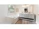 Bright bathroom featuring double vanity, soaking tub, and glass block window at 9249 Miranda Dr, Raleigh, NC 27617