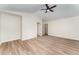 Large bedroom featuring vaulted ceiling, ceiling fan, and luxury vinyl flooring at 9249 Miranda Dr, Raleigh, NC 27617