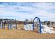 Community playground featuring climbing structures, swings, and a soft landing surface for safe play at 1016 Channel Drop Lp, Zebulon, NC 27597