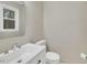 Bathroom featuring a quartz vanity, neutral paint, fresh paint, and light colored walls at 1041 Limerick Ln, Durham, NC 27713
