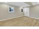 Spacious bedroom features recessed lighting, neutral paint, wood flooring and windows at 1041 Limerick Ln, Durham, NC 27713