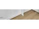 Close-up showcasing contemporary wood flooring and the baseboard trim at 1041 Limerick Ln, Durham, NC 27713