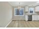 Bright kitchen features stainless steel appliances, ample cabinets, and an eat-in dining area at 1041 Limerick Ln, Durham, NC 27713