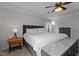 This bedroom features a ceiling fan and neutral color palette at 1104 Pebblestone Dr, Durham, NC 27703