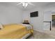 This bedroom features a ceiling fan and is adjacent to another room at 1104 Pebblestone Dr, Durham, NC 27703