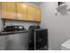 This laundry room features a front load washer and dryer at 1104 Pebblestone Dr, Durham, NC 27703