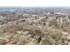 A bird's eye view of a residential neighborhood showcases the density and layout of the community at 115 N Oakland Dr, Mebane, NC 27302