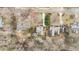 An aerial view of a home in a neighborhood showcases the property's location and surrounding area at 115 N Oakland Dr, Mebane, NC 27302