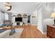 Inviting living room features hardwood floors and stylish decor at 115 N Oakland Dr, Mebane, NC 27302