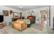 A bedroom featuring a decorative rug, couch, lamps, and an interior view into a connecting room at 11843 Canemount St, Raleigh, NC 27614