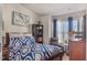This bedroom offers a peaceful retreat, flooded with natural light, providing a comfortable and relaxing space at 11843 Canemount St, Raleigh, NC 27614