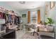 This walk-in closet boasts ample hanging space, shelving, drawers, and bright light for seamless organization at 11843 Canemount St, Raleigh, NC 27614