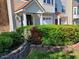 Inviting townhome exterior with well-maintained landscaping and a charming front entrance at 11843 Canemount St, Raleigh, NC 27614
