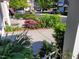 View of street and lush landscaping from front porch at 11843 Canemount St, Raleigh, NC 27614