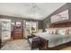 Spacious bedroom boasts neutral walls, stylish furniture, and natural light, creating a cozy and inviting retreat at 11843 Canemount St, Raleigh, NC 27614
