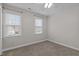 Bedroom with neutral walls, carpeted flooring, ceiling fan and natural light at 1212 Eastham Dr, Apex, NC 27502