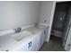 Bright bathroom featuring double sinks, white cabinets, and modern fixtures at 122 Weavers Grove Dr, Chapel Hill, NC 27514