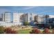 View of the exterior of the McLendon Clinical Center Hospital surrounded by trees and lawns at 122 Weavers Grove Dr, Chapel Hill, NC 27514