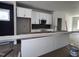New kitchen featuring white cabinets and a modern backsplash, ready to be completed at 122 Weavers Grove Dr, Chapel Hill, NC 27514
