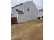 Spacious side yard with a privacy fence and vinyl siding at 1304 Cozart St # 414, Durham, NC 27704