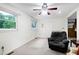 Bright bedroom features a window and neutral carpet flooring at 1418 Kirkwood Drive Dr, Durham, NC 27705