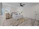 Cozy bedroom with a plush rug, comfortable bed, and ample natural light at 1604 Palmer Dr, Graham, NC 27253