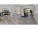 Open dining room with natural light, adjacent to the living room and kitchen, ideal for Gathering gatherings at 1604 Palmer Dr, Graham, NC 27253