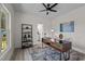 Bright office space with modern desk, shelving, and stylish decor, perfect for a productive work environment at 1604 Palmer Dr, Graham, NC 27253