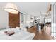 Bright, open kitchen with white cabinets, stainless steel appliances and large marble island at 1636 Sweetwater Ln, Raleigh, NC 27610