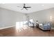 Spacious living room with hardwood floors, modern furnishings, and plenty of natural light at 1636 Sweetwater Ln, Raleigh, NC 27610