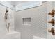 Shower with rain head, bench, and herringbone tile walls at 1636 Sweetwater Ln, Raleigh, NC 27610
