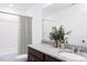 Bathroom featuring a modern vanity with granite countertops and a shower/tub combination at 174 Blue Butterfly Dr, Angier, NC 27501