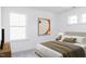 Cozy bedroom with soft lighting and a modern decor, creating a peaceful atmosphere for relaxation at 174 Blue Butterfly Dr, Angier, NC 27501