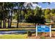 Image of Neill's Creek Park Sign showcasing green space and recreational opportunities for community enjoyment at 174 Blue Butterfly Dr, Angier, NC 27501