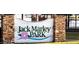 Entrance sign to Jack Marley Park, featuring a stone-framed display and cheerful lettering at 174 Blue Butterfly Dr, Angier, NC 27501