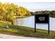 Lakeside Walking Trails sign by a lake at 182 Blue Butterfly Dr, Angier, NC 27501