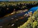 Scenic view of a river with rocks and trees, reflecting the natural beauty of the surrounding landscape at 182 Blue Butterfly Dr, Angier, NC 27501
