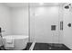 Modern bathroom showcases a walk-in shower, soaking tub, and elegant tile work at 200 Arlington Cir Cir, Sanford, NC 27330