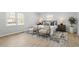 Serene bedroom featuring a plush bed, neutral tones, and ample natural light at 200 Arlington Cir Cir, Sanford, NC 27330
