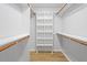 Well-organized walk-in closet with ample shelving and storage space for optimal organization at 200 Arlington Cir Cir, Sanford, NC 27330