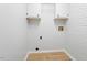 Bright laundry room with built-in cabinets, offering convenience and storage at 200 Arlington Cir Cir, Sanford, NC 27330
