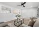 Bright living room with modern decor, comfortable seating and ample natural light at 200 Arlington Cir Cir, Sanford, NC 27330