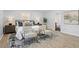 Spacious main bedroom with neutral tones, sitting area, and abundant natural light at 200 Arlington Cir Cir, Sanford, NC 27330