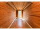 Finished attic space featuring wood paneling on the walls and ceiling at 204 N Sixth St, Mebane, NC 27302