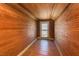 Finished attic space featuring wood paneling on the walls and ceiling at 204 N Sixth St, Mebane, NC 27302